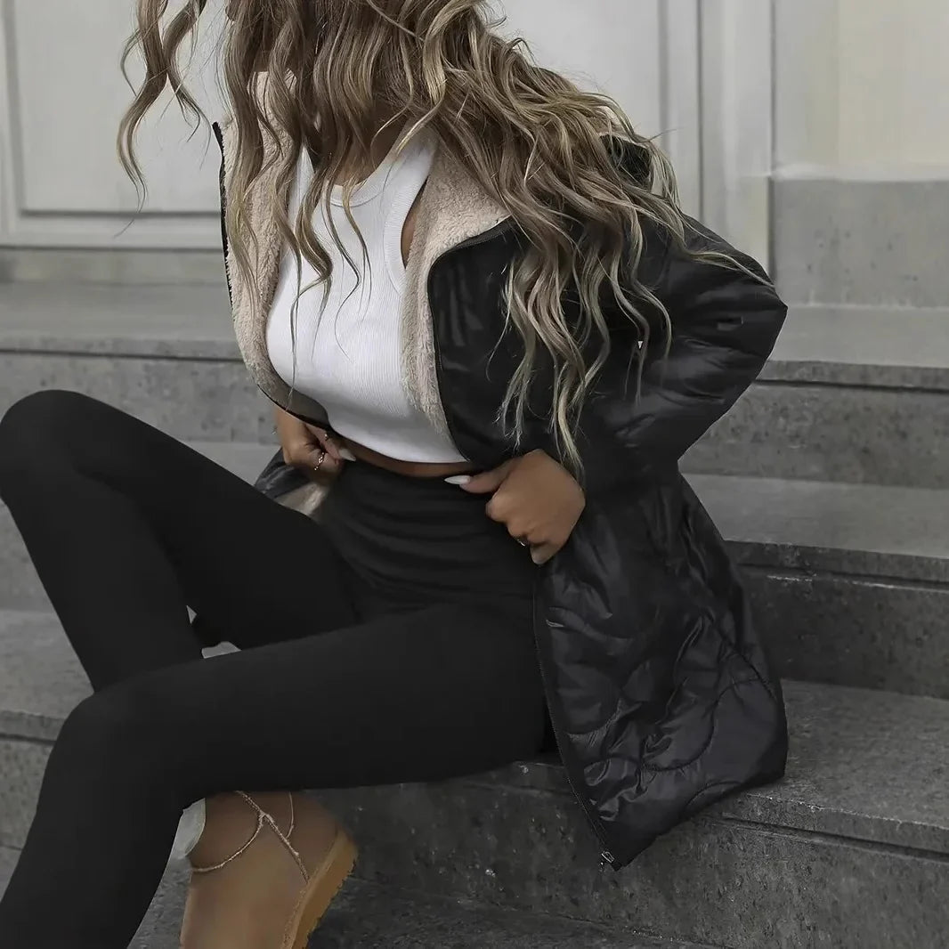 Moteriška juoda laisvalaikio striukė