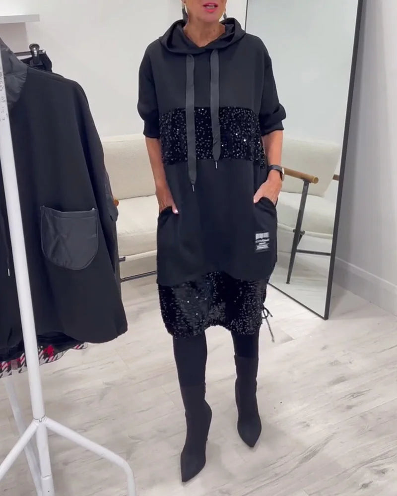 Patogi, madinga suknelė su gobtuvu