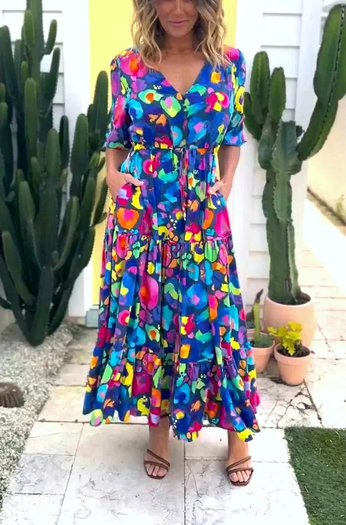 Moteriška gėlių rašto midi suknelė