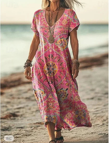 Vasarinė, laisva, gėlių rašto suknelė