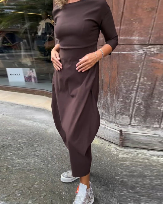 Elegantiška vienspalvė suknelė su kišenėmis